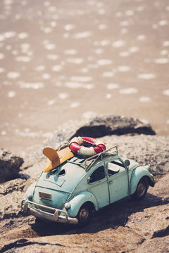 Fototapeta Miniature car in the rocks