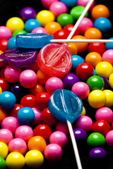 Fototapeta na wymiar gumballs and lollipops