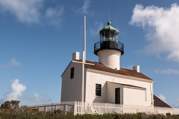 Fototapeta na wymiar Old Point Loma lighthouse on cloudy day in San Diego, California.