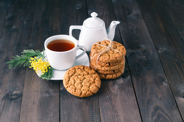 tea cup with sweet cookie