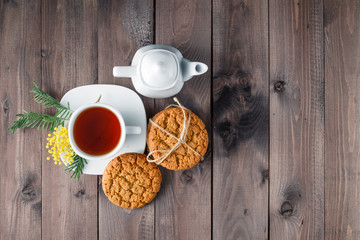 top view of tea cup with sweet cookie