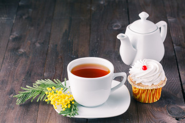 Cup of tea on dark table
