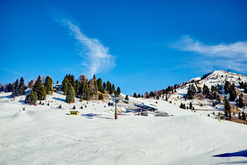mountains slope with ski lift