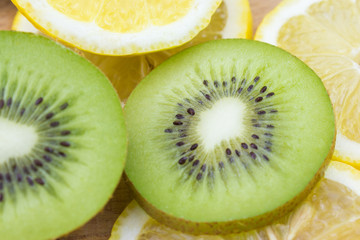 Naklejka na ściany i meble kiwi and lemon fruit slices closeup