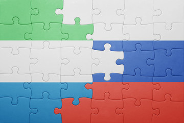 puzzle with the national flag of russia and sierra leone