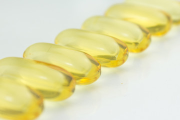 fish oil pills - omega 3 capsules on white background