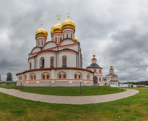 Fototapeta na wymiar Iver Cathedral to Valdai Iver Svyatoozersky Mother of God Monastery. Panorama