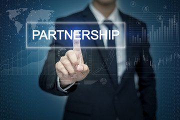 Businessman hand touching PARTNERSHIP  button on virtual screen