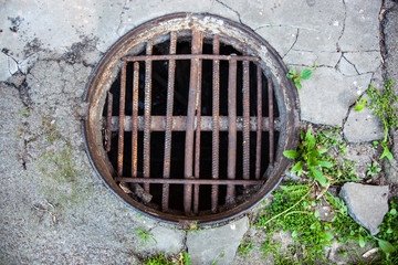 Manhole with the handmade metal armature cover