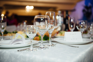 Wedding glasses filled with champagne at banquet