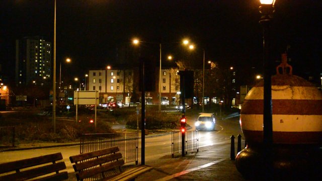 Ipswich town at night time.Cars stopped by signal of traffic light. Suffolk. East England. 5 march 2016