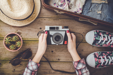 Travel preparations on wooden table
