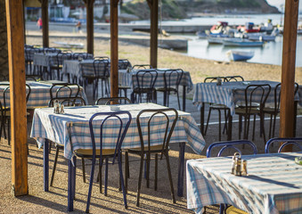 Greek tavern with blue chairs, Greece