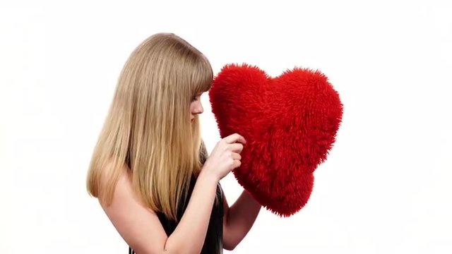 Woman angry punching red heart love symbol 4K