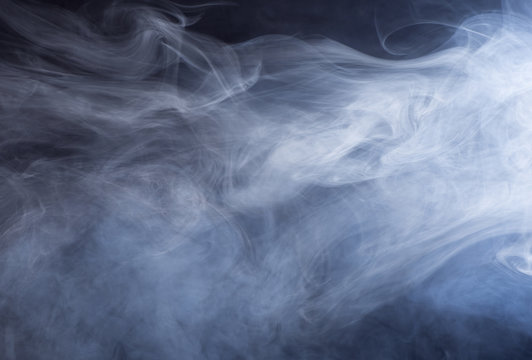 Glowing Abstract Background of Swirling Smoke