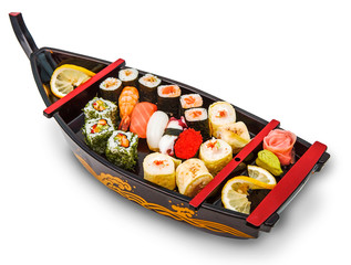 Set of sushi and rolls on dish rook. Isolated on white background
