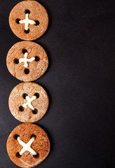 Chocolate chips cookies isolated on black