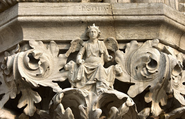 Justice goddess on Doge's Palace beautiful capital, in Venice