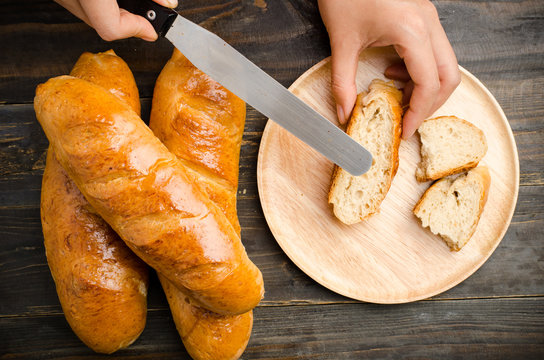 Fresh bread on wooden background,ready to eat
