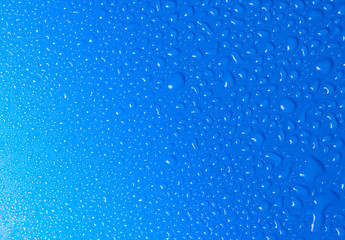 Fototapeta na wymiar background of water drops on blue