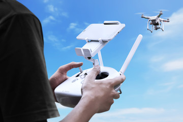 Male pilot controlling drone