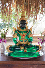 Emerald Buddha image, Green buddha Statue made with glass in Thai Temple.