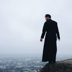 lonely priest on mountains