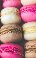 Colourful sweet tasty macaroons macaron in a row pastel