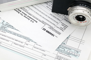 Camera on tax form background
