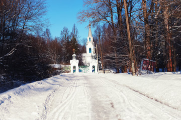 sun day church in the winter forest
