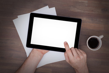 Tablet touch computer gadget on wooden table