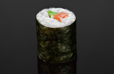 Sushi rolls with avocado and salmon.