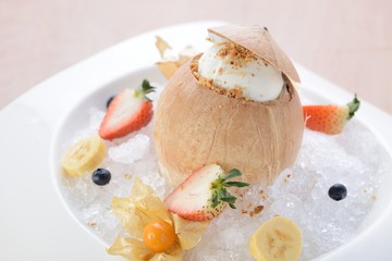 Coconut jelly with ice cream on a fruits plate