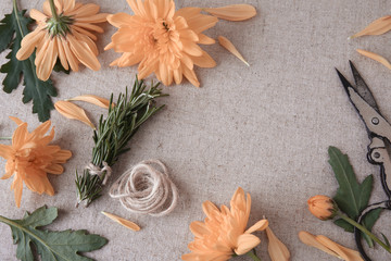 Fototapeta na wymiar Identity and craft mockup with orange flowers,selective focus