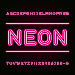 Neon Light Alphabet Font. Type letters, numbers and symbols. Red neon tube letters on the dark background. Vector typeset for labels, titles, posters etc.
