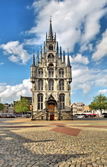 City Hall in the Dutch city of Gouda is built in the style of 