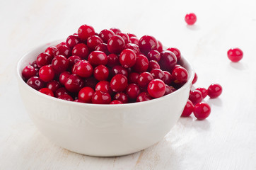 Fresh cranberries in bowl.