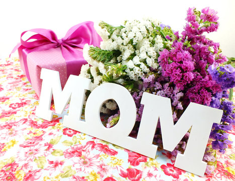 text mom and statice flower bouquet with printed fabric mother's day concept