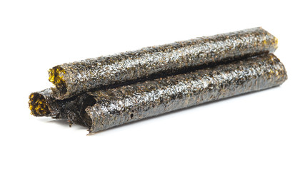 Kombu and kim nori on bamboo mat over white background