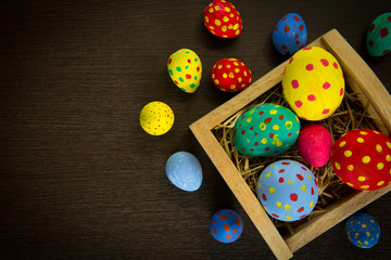 Easter eggs on wooden background