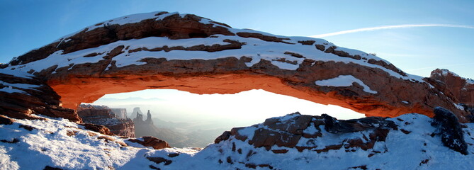 Mesa Arch. Canyonlands National Park. Sunrise January Snowy