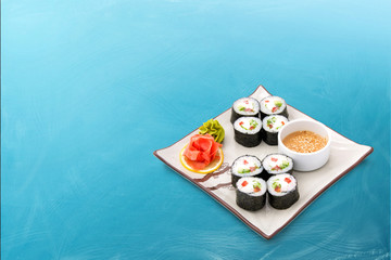 Sushi roll set with seaweed and sauce