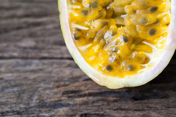 Passion fruits on wooden background