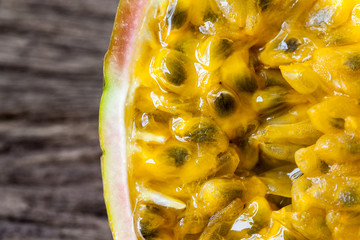 Passion fruits on wooden background