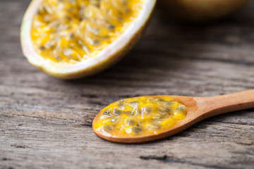 Passion fruits on wooden background