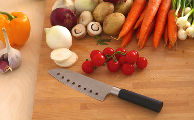 Pile of organic vegetables on a wooden table