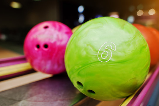 Two colored bowling balls of number 6 and 7. Kids ball for bowli