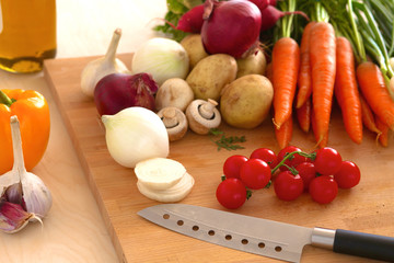 Pile of organic vegetables on a wooden table