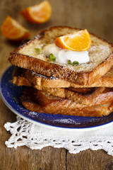 French toasts with cream and orange