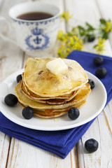 Pancakes with blueberry and maple syrup